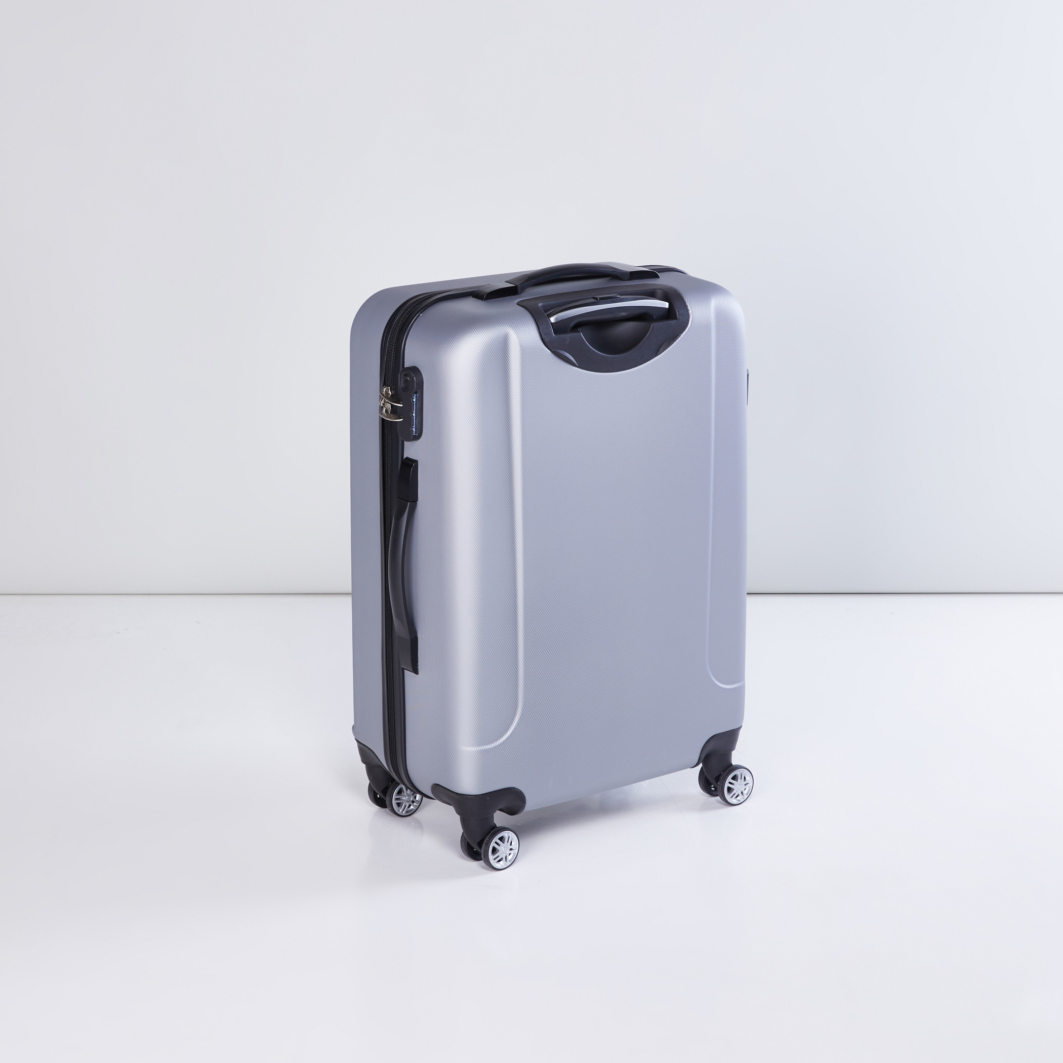 Shop Textured 360 Spinner Hard Case Trolley Bag Online Max UAE