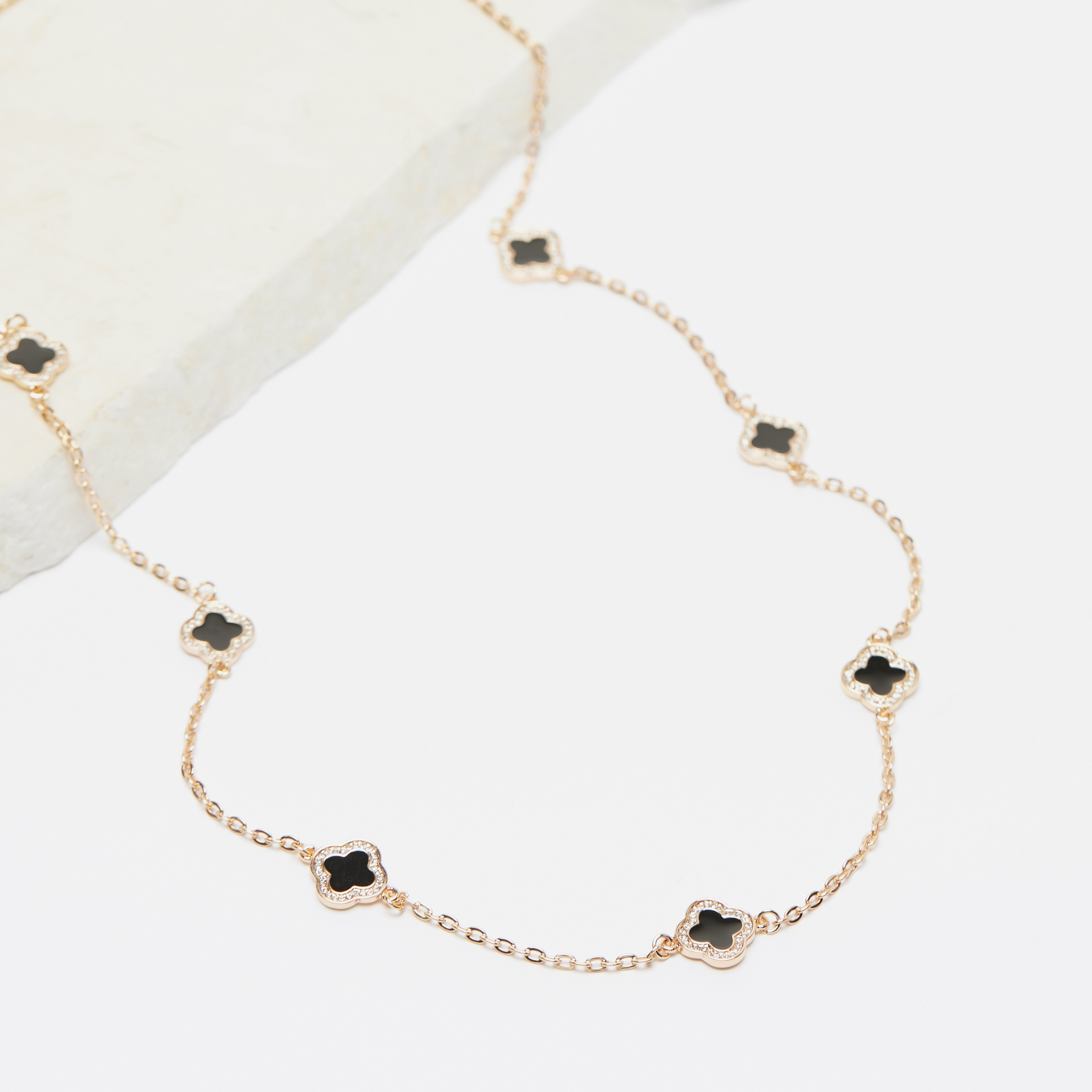 Shop Studded Clover Accented Necklace with Lobster Clasp Closure