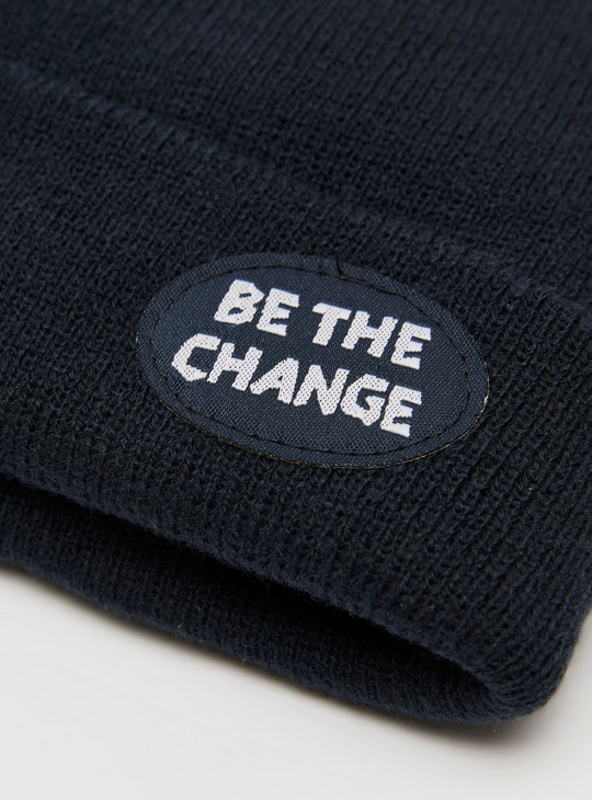 Textured Beanie Cap with Rolled Hem and Badge Detail