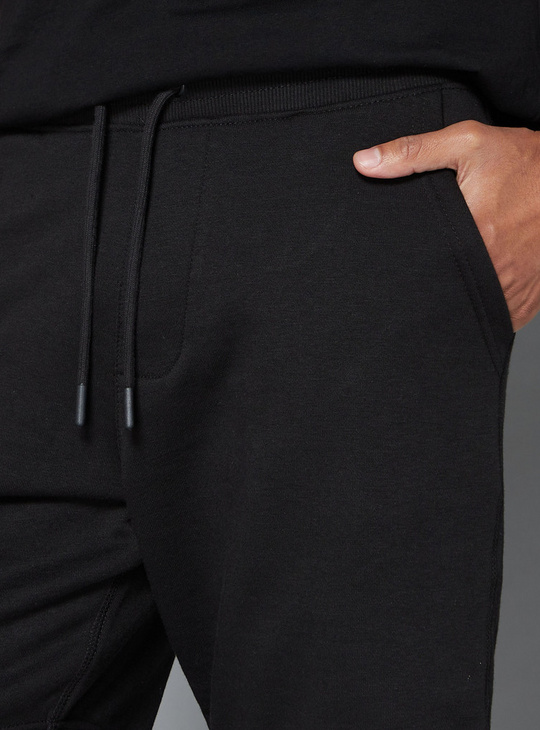 Solid Anti-Pilling Shorts with Pockets and Drawstring Closure