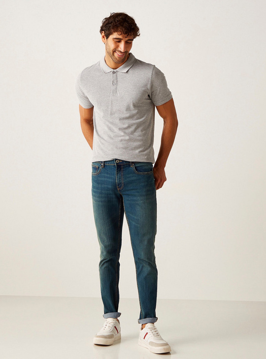 Solid BCI Cotton Mid-Rise Jeans with Pockets and Button Closure