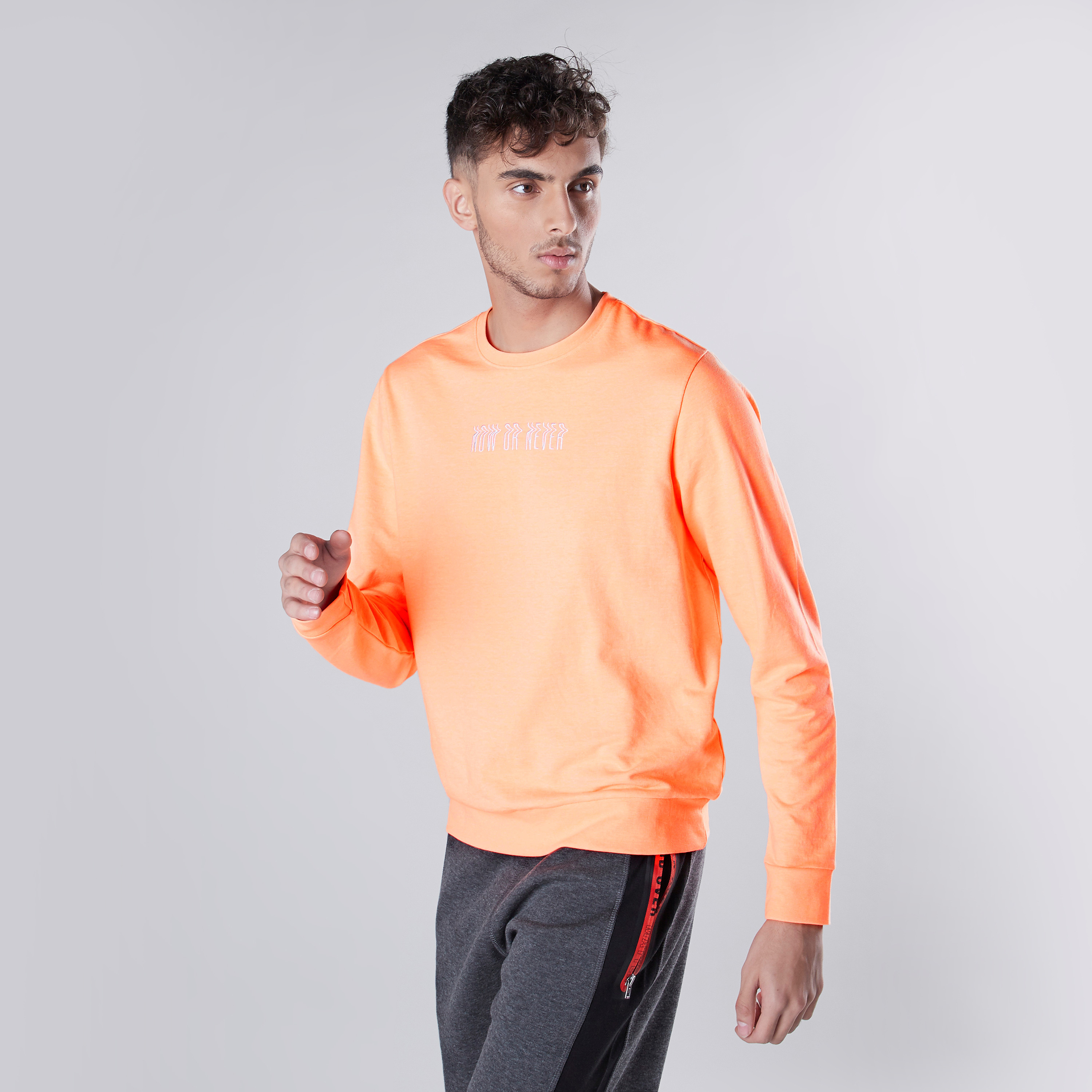 Orange crew neck on sale sweatshirt