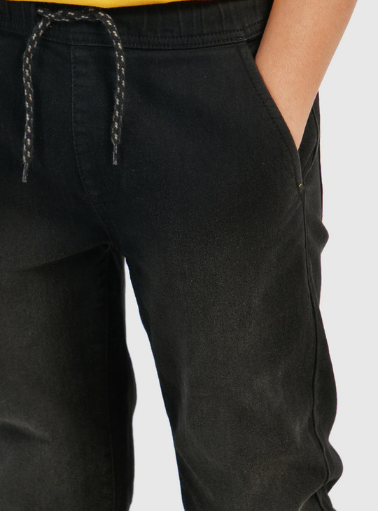 Solid Mid-Rise Jog Pants with Drawstring Closure and Pockets