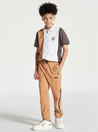 Solid Mid-Rise Panel Jog Pants with Drawstring Closure and Pockets