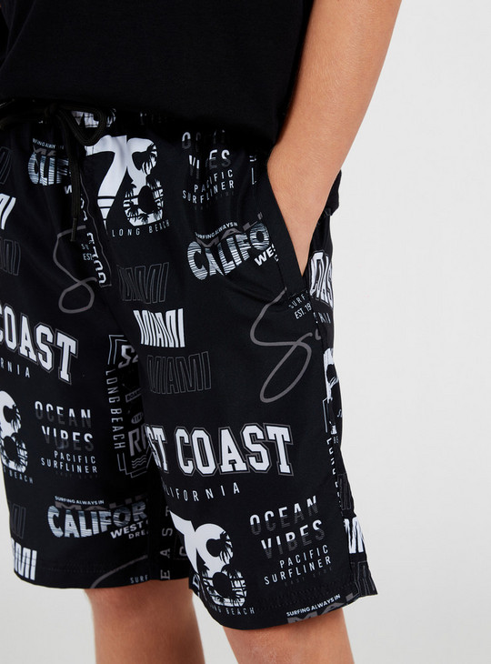 All-Over Text Print Swim Shorts with Pockets and Drawstring Closure