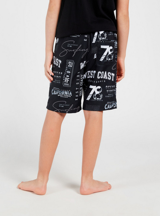 All-Over Text Print Swim Shorts with Pockets and Drawstring Closure