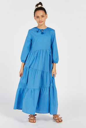 Solid Maxi Tiered Dress with Long Sleeves and Tie-Up Tassel Detail