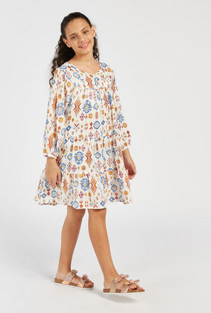 All-Over Print Boho Tiered Dress with Long Sleeves and Tie-Up Detail