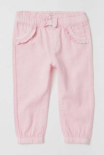 Solid Mid-Rise Pants with Pockets and Frill Detail