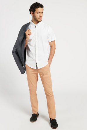 Solid Skinny Fit Mid-Rise Chinos with Pockets and Button Closure