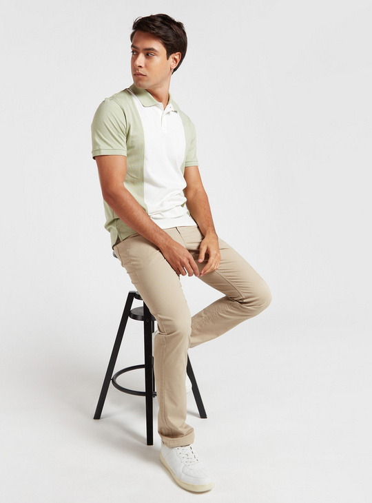 Solid Slim Fit Mid-Rise Pants with Pockets and Button Closure