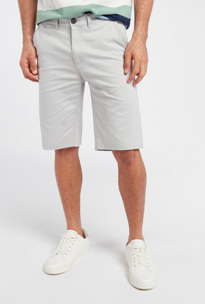 Solid Mid-Rise Chino Shorts with Pockets and Button Closure