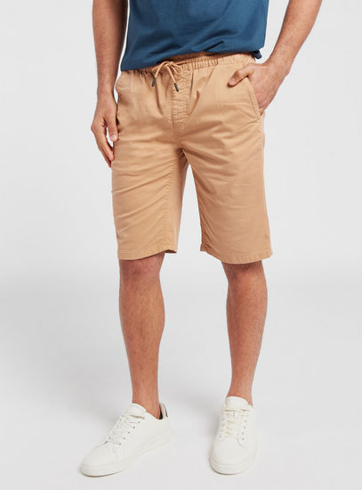 Solid Mid-Rise Shorts with Pockets and Drawstring Closure-Shorts-image-0