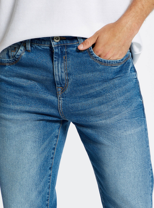 Solid Carrot Fit Mid-Rise Jeans with Button Closure