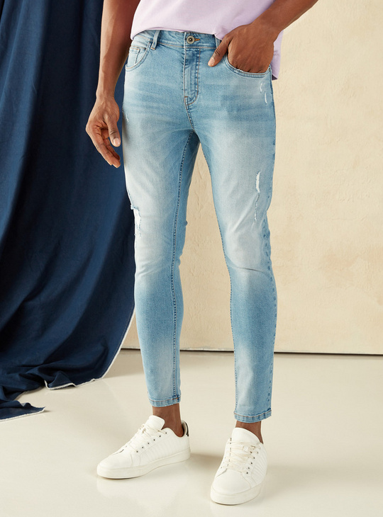 Ripped Mid-Rise Denim Jeans with Button Closure