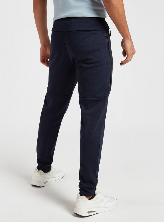 Solid Slim Fit Jog Pants with Pockets and Drawstring Closure