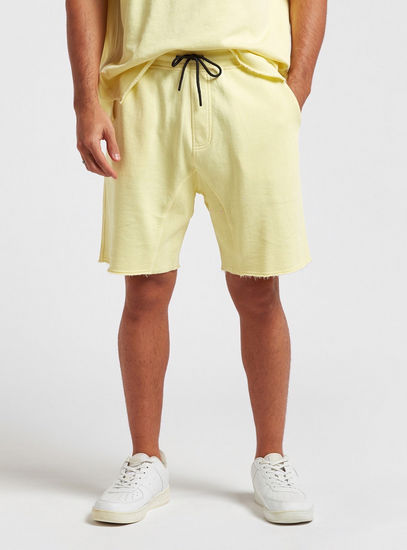 Solid Slim Fit Shorts with Pockets and Drawstring Closure