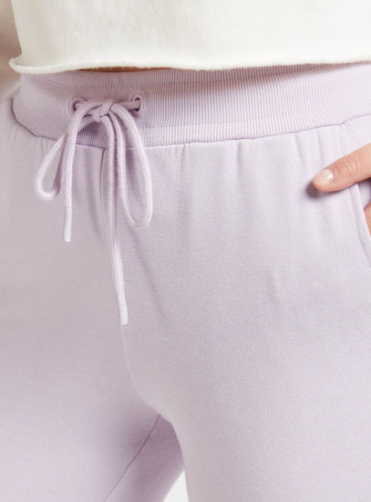 Solid Mid-Rise Jog Pants with Drawstring Closure and Pockets