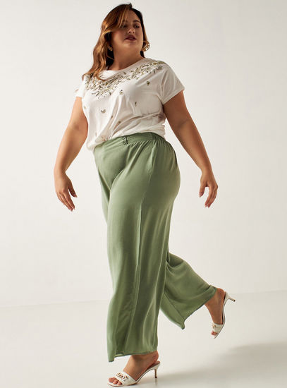 Solid Mid-Rise Wide Leg Pants with Button Detail and Elasticated Waistband