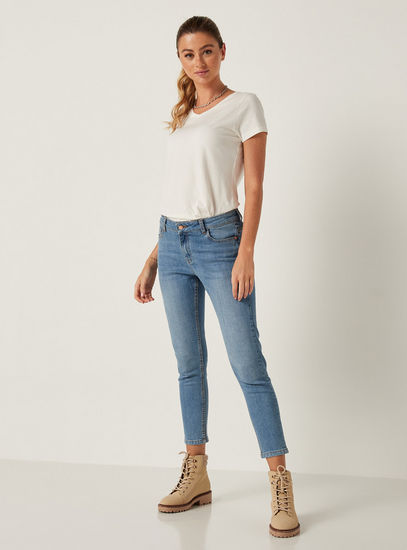 Solid Mid-Rise Denim Jeans with Button Closure and Pockets