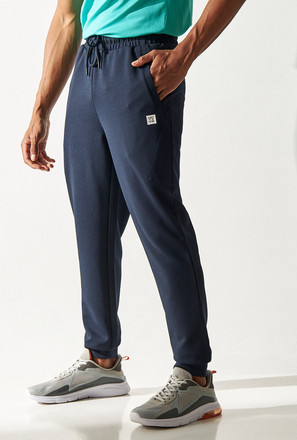 Textured Slim Fit Joggers with Drawstring Closure and Pockets