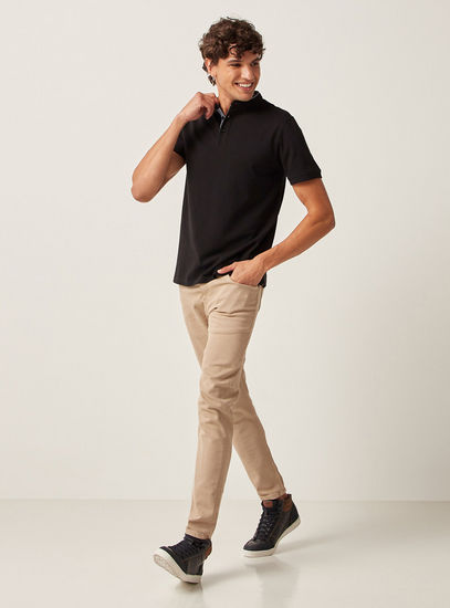 Solid Mandarin Neck Polo T-shirt with Short Sleeves and Button Closure