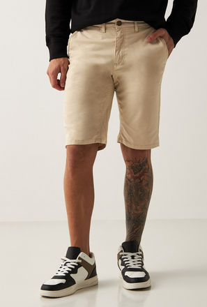 Solid Mid-Rise Shorts with Button Closure and Pockets