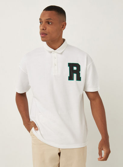 Printed Oversized Polo T-shirt with Short Sleeves and Button Closure