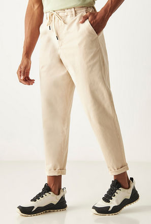 Solid Relaxed Fit Pants with Drawstring Closure and Pockets