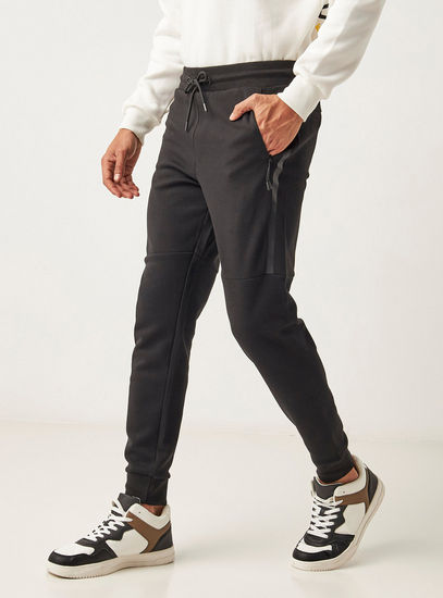 Solid Slim Fit Pique Joggers with Drawstring Closure and Pockets
