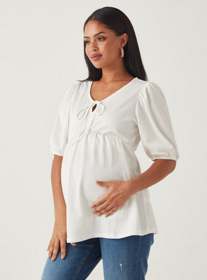 Textured Peplum Maternity Top with Tie-Ups-Tops & T-shirts-image-0