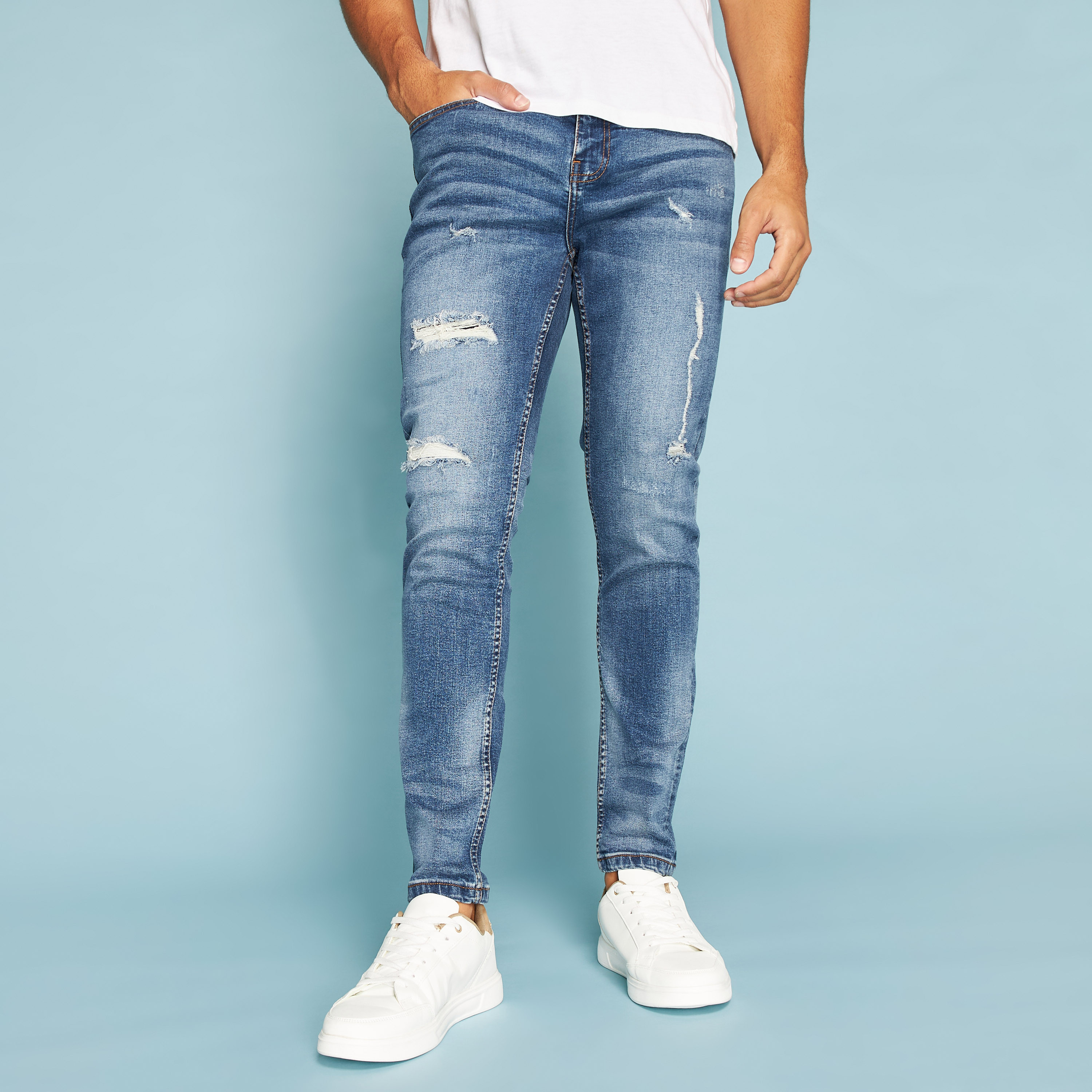 Carrot fit ripped jeans online