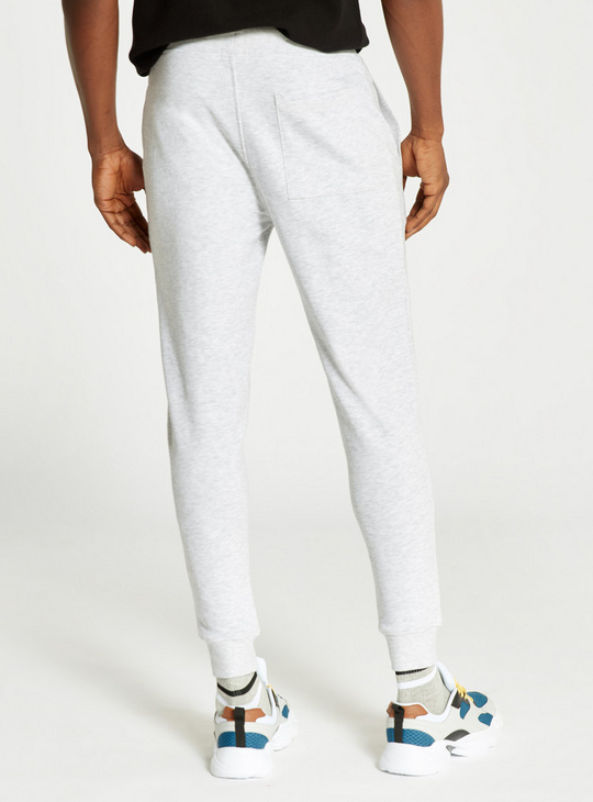 Solid Mid-Rise Jogger with Drawstring Closure and Pockets