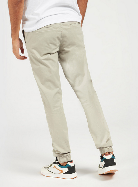 Solid Mid-Rise Jog Pants with Drawstring and Pockets