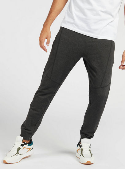 Solid Slim Fit Joggers with Panelled Detailing and Pockets