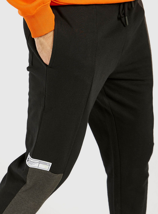 Solid Slim Fit Jog Pants with Drawstring Closure and Side Panel Detail