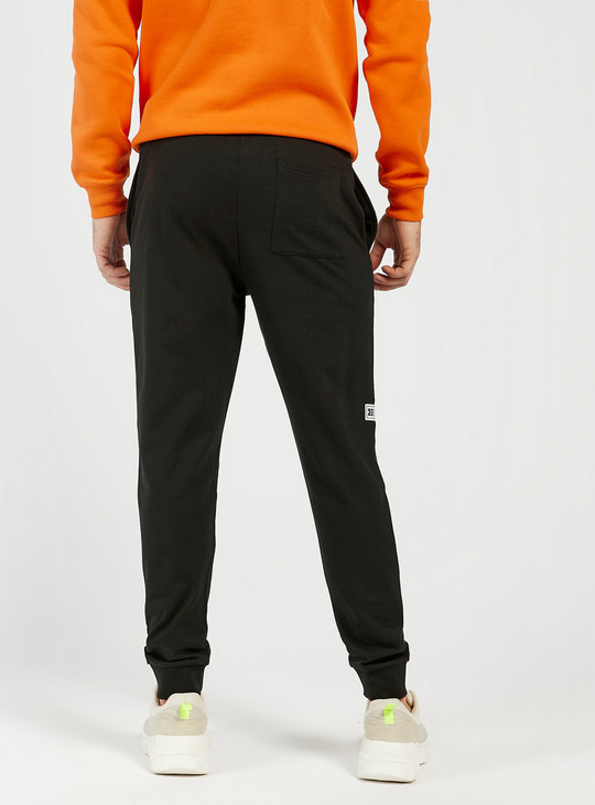 Solid Slim Fit Jog Pants with Drawstring Closure and Side Panel Detail