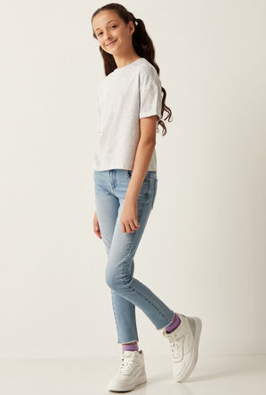 Solid Mid-Rise Skinny Fit Jeans with Frayed Hem and Pockets