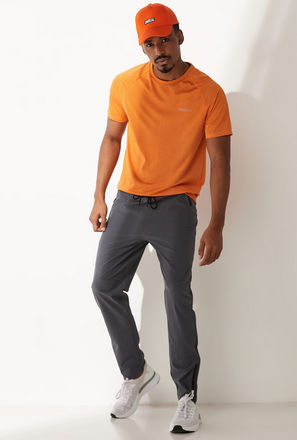 Solid Track Pants with Side Zip and Pocket