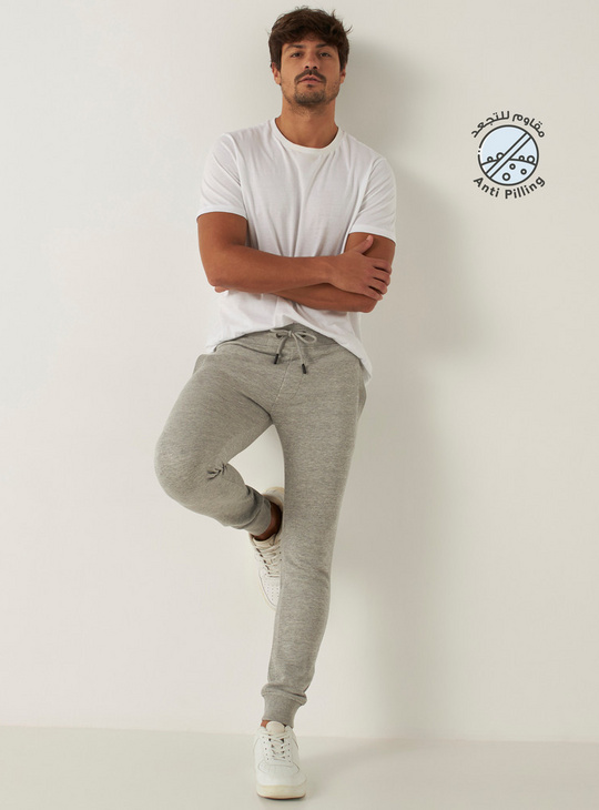 Solid Skinny Fit Mid-Rise Joggers with Drawstring Closure