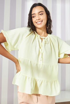 Tiered Short Sleeve Top with Tie-Ups and Ruffle Detail