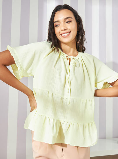 Tiered Short Sleeve Top with Tie-Ups and Ruffle Detail