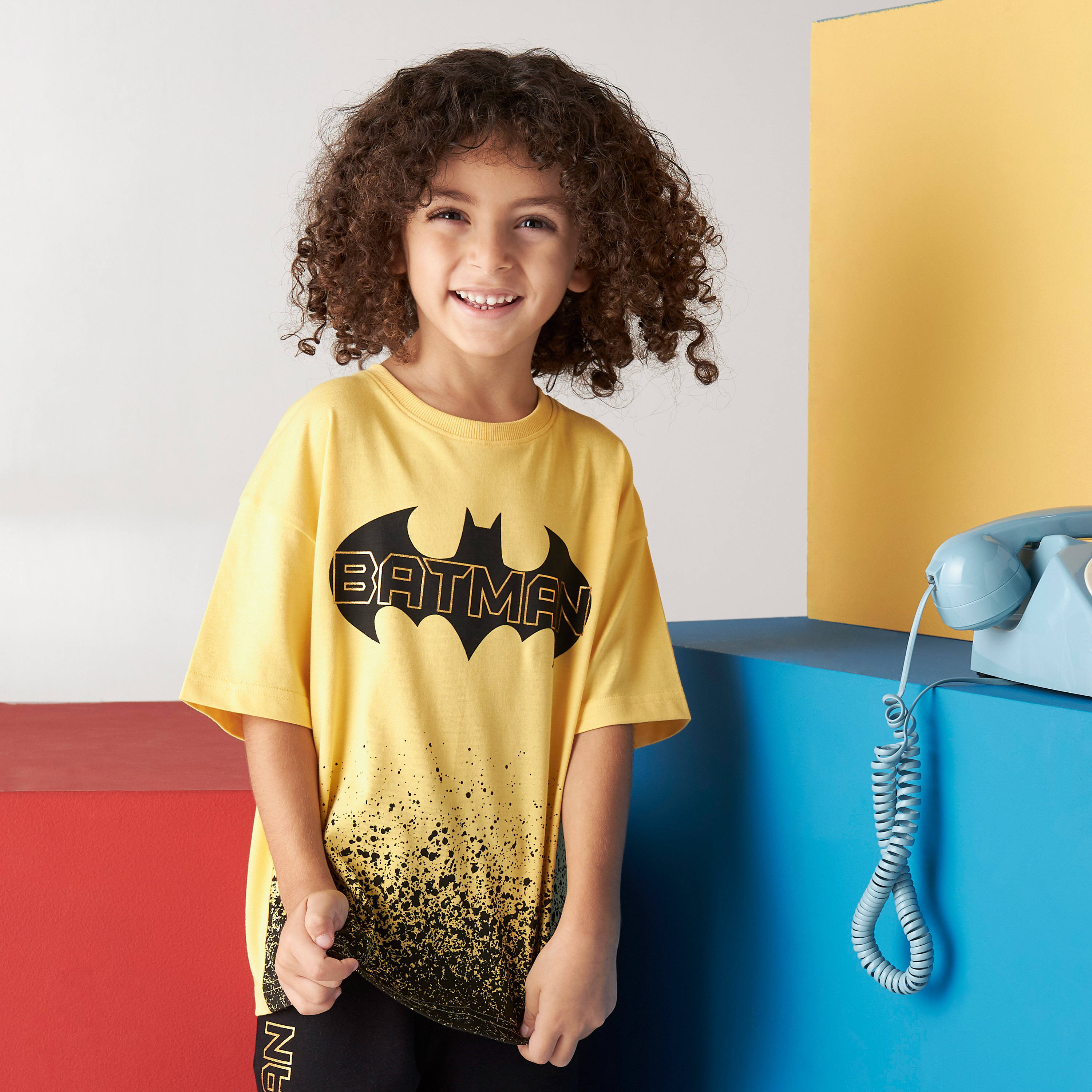 Girl wearing outlet batman t shirt