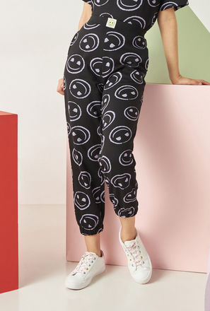 All-Over Smiley Print Joggers-mxkids-girlseighttosixteenyrs-clothing-bottoms-pants-1