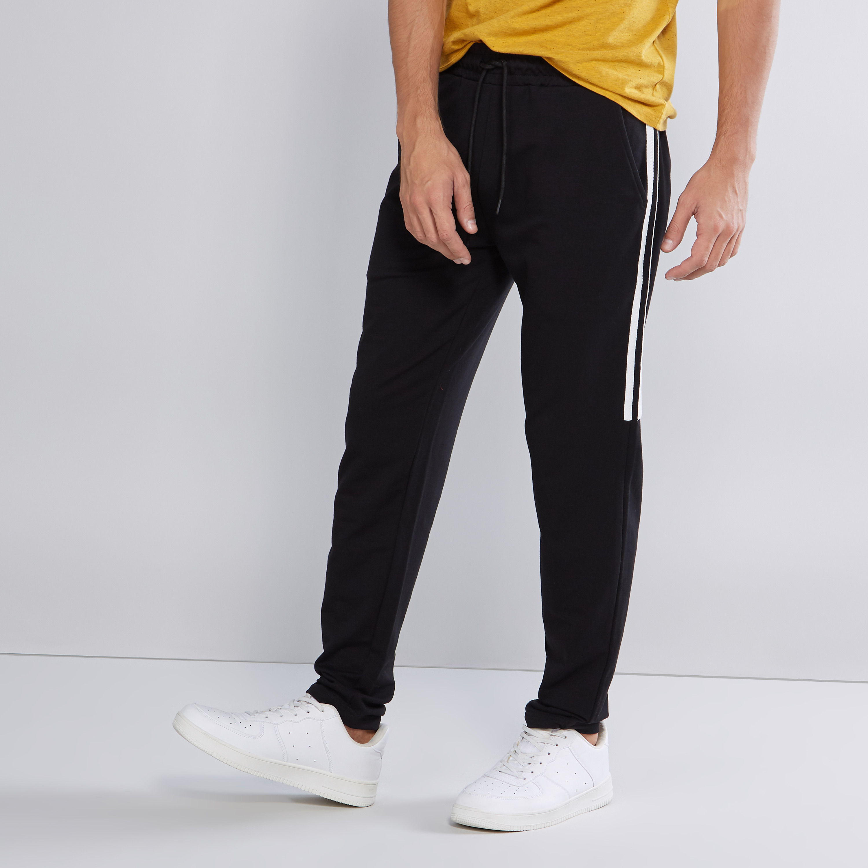 Mens track pants with stripe hot sale