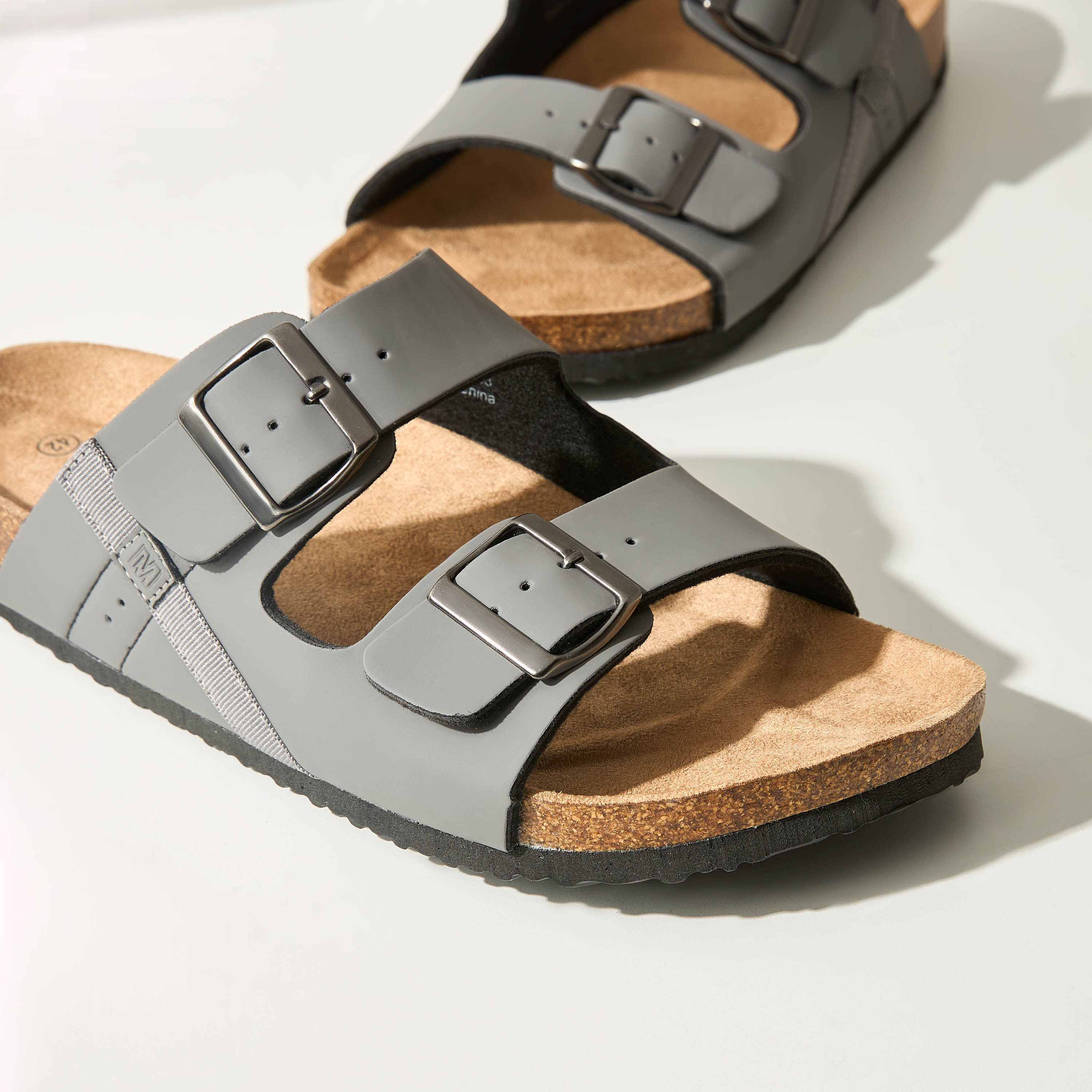 Buckle slip hot sale on sandals