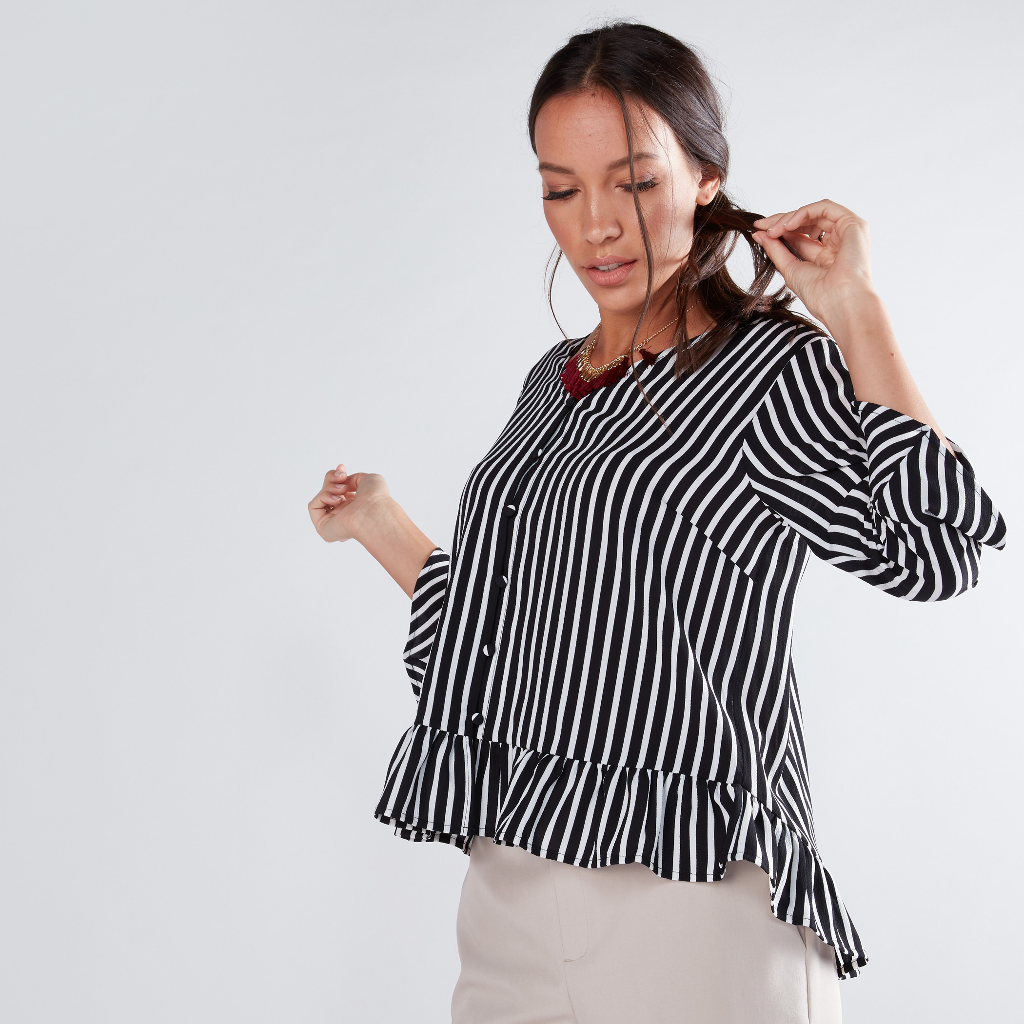 Striped peplum clearance shirt