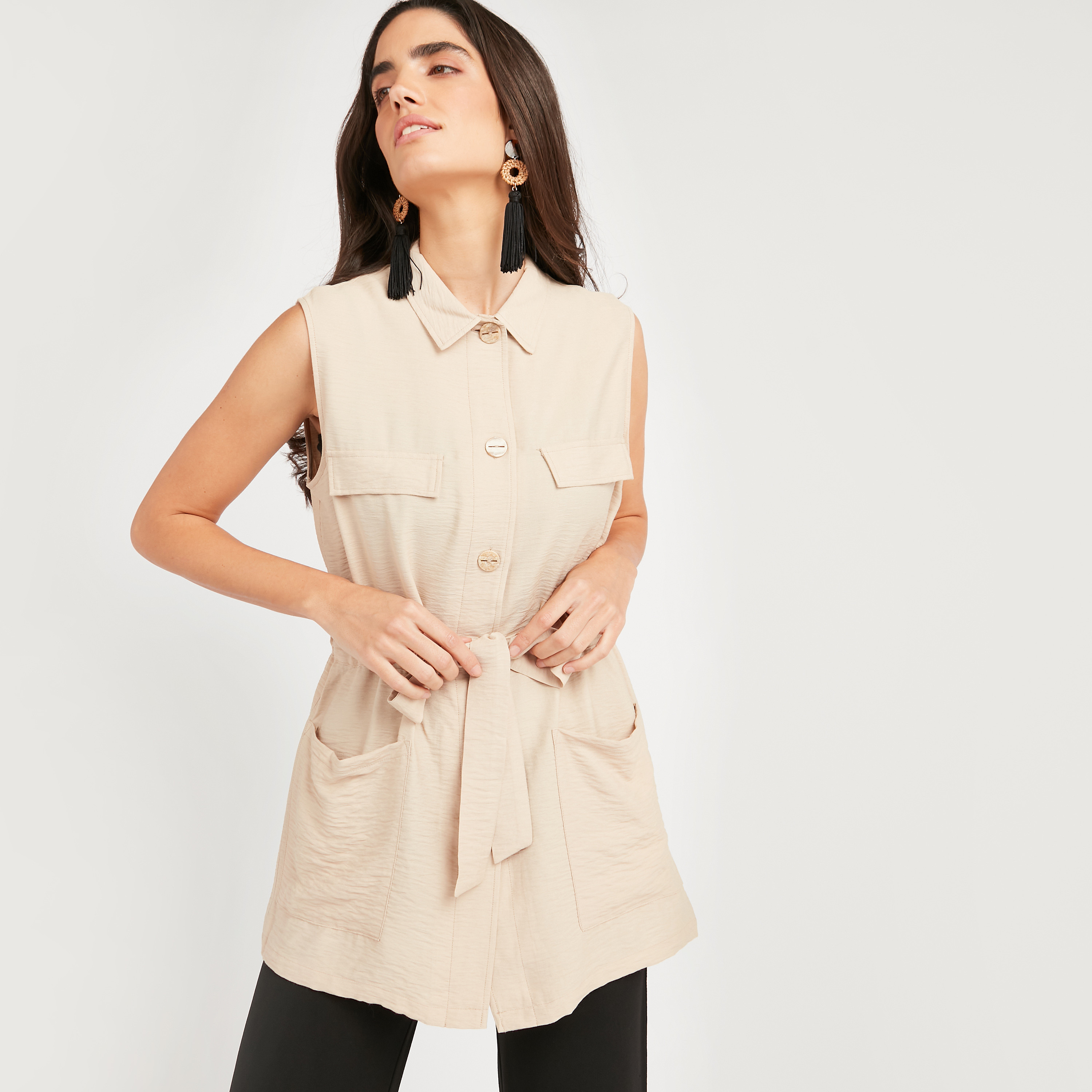 Women's sleeveless jackets with on sale pockets