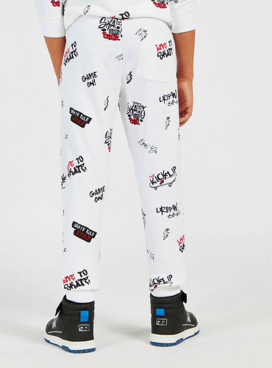 All-Over Printed Jog Pants with Pockets and Drawstring Closure