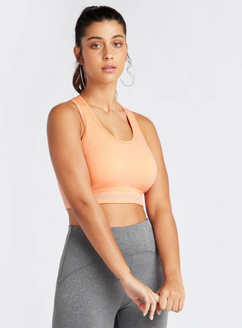 Shop Slim Fit Medium Support Solid Sports Bra with Scoop Neck and Racerback  Online